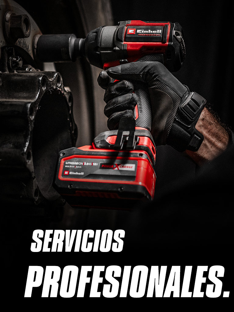 Primer plano de una llave de impacto inalámbrica roja que se utiliza en una rueda, con el texto "Servicios profesionales".