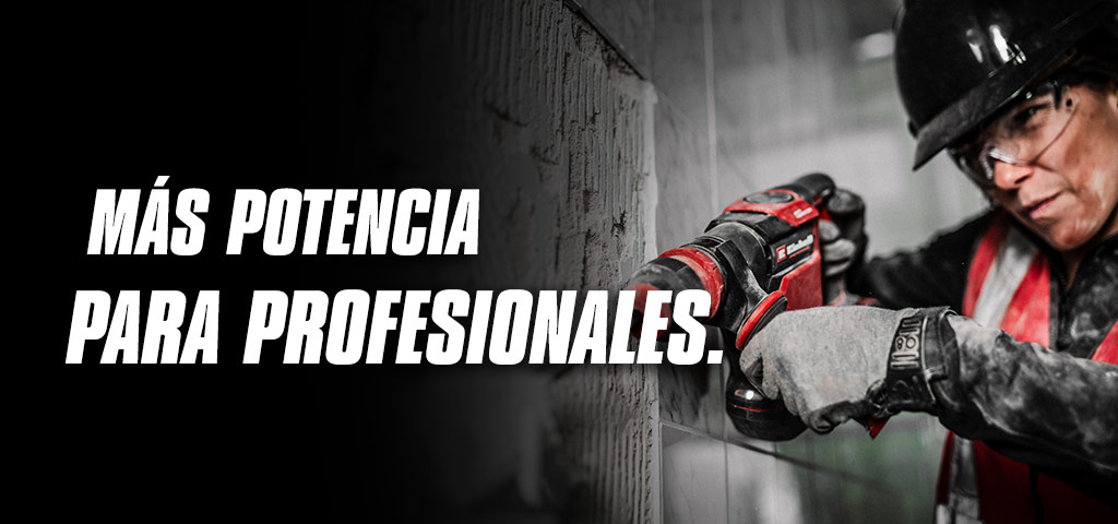 Una persona con gafas de seguridad y casco utiliza un taladro rojo en una pared, con el texto "Más potencia para profesionales".